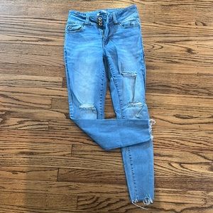 Light denim low rise skinny jeans